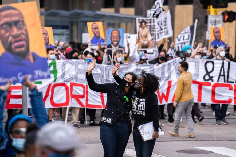 Protester with ACAB patch during Chauvin march 3 Protesters rally and march through Downtown Minneapolis on the day opening statements began in the Derek Chauvin murder trial. Chauvin is accused of murdering George Floyd on May 25th, 2020.