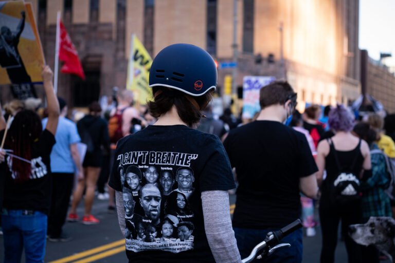 Protester with I Cant Breathe shirt on at start of George Floyd 2 Protesters rally and march through Downtown Minneapolis on the day opening statements began in the Derek Chauvin murder trial. Chauvin is accused of murdering George Floyd on May 25th, 2020.