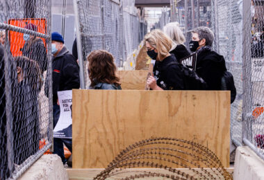 Protesters walking into "The Cage" around the Hennepin County Government Center.