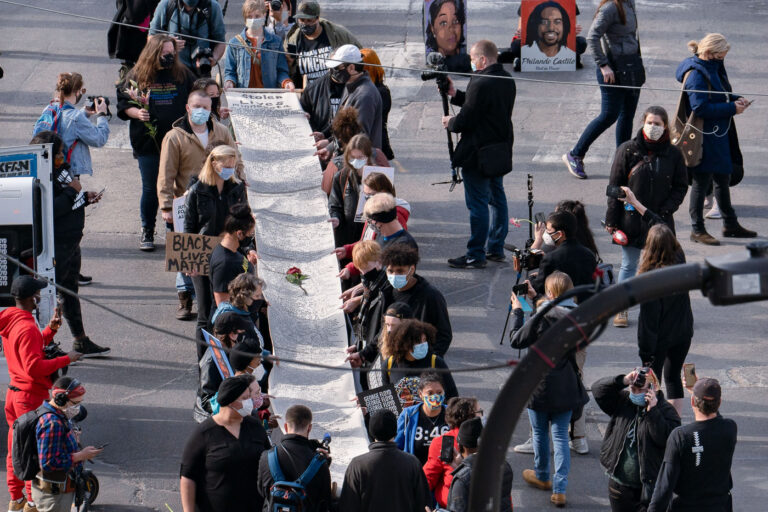 Protesters in downtown Minneapolis in March 2021 4 The day before Derek Chauvin goes on trial in Minneapolis for the murder of George Floyd a thousand march from the Government Center and down Hennepin Ave with a scroll that has 470+ names of people killed by MN police. Organizers point out Chauvin was involved in 5 of the names.
