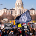 Protesters march near the Minnesota State Capitol demanding justice for George Floyd as well as all lives impacted by police brutality.