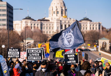 Protesters march near the Minnesota State Capitol demanding justice for George Floyd as well as all lives impacted by police brutality.