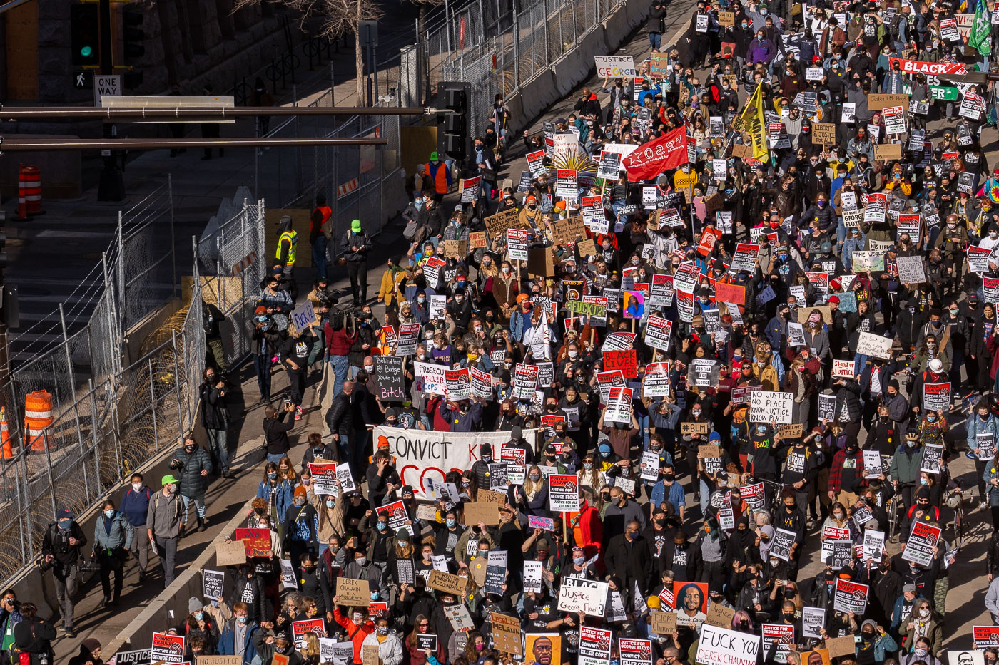 Protesters march through downtown at start of Chauvin trial