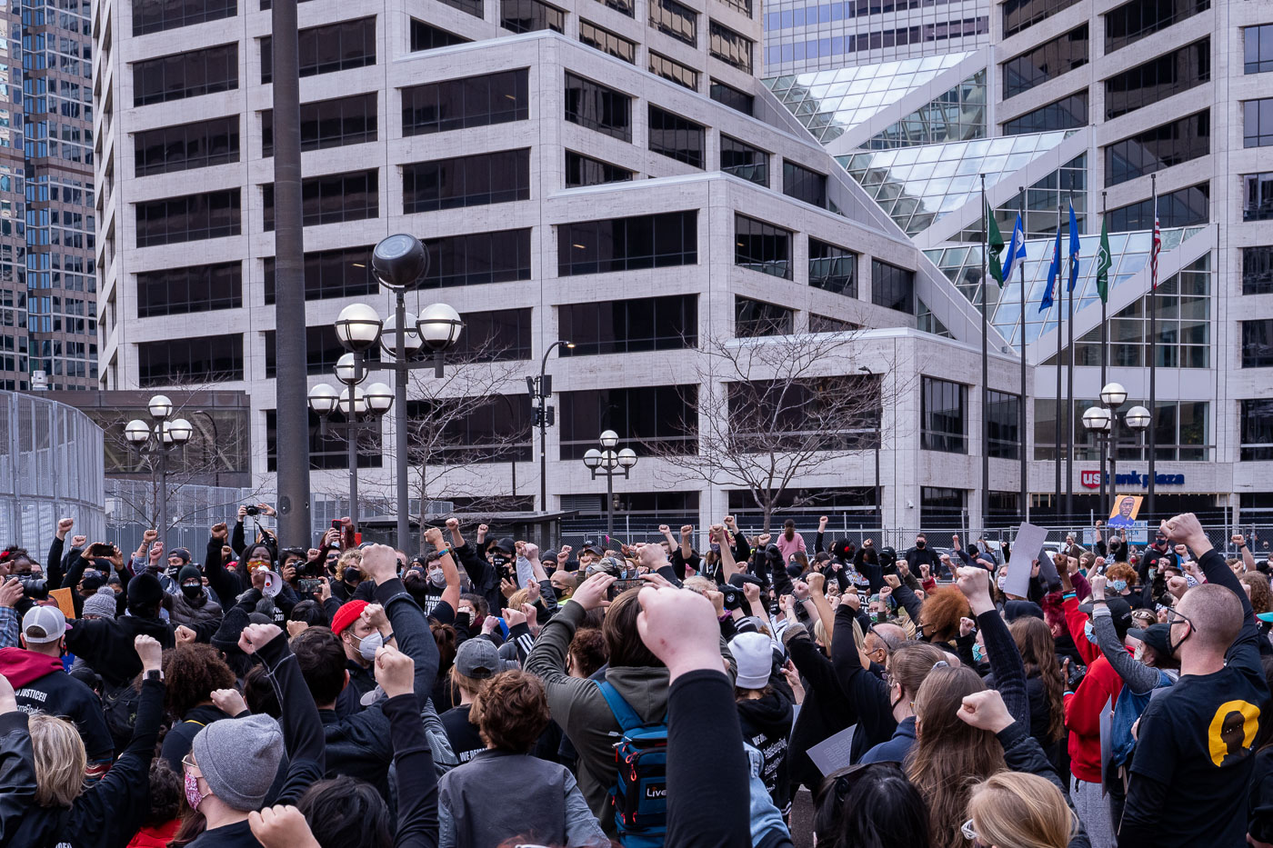 Protesters put hands up outside courthouse during Chauvin trial