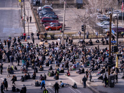 Protesters sit during Chauvin trial march in Minneapolis