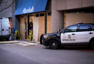 Boards being put over storefronts in downtown Minneapolis in preperation for the Derek Chauvin murder trial.