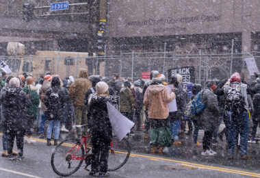 Protesters march around the Hennepin County Government Center demanding a fair jury selection process in the Derek Chauvin trial. Former Minneapolis Police Officer Derek Chauvin is accused of murdering George Floyd on May 25th, 2020.