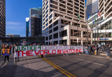 Protesters gathered outside the Hennepin County Government Center prior to the 8am start of the Derek Chauvin trial. Former Minneapolis Police Officer Derek Chauvin is charged in the murder of George Floyd on May 25th, 2020.