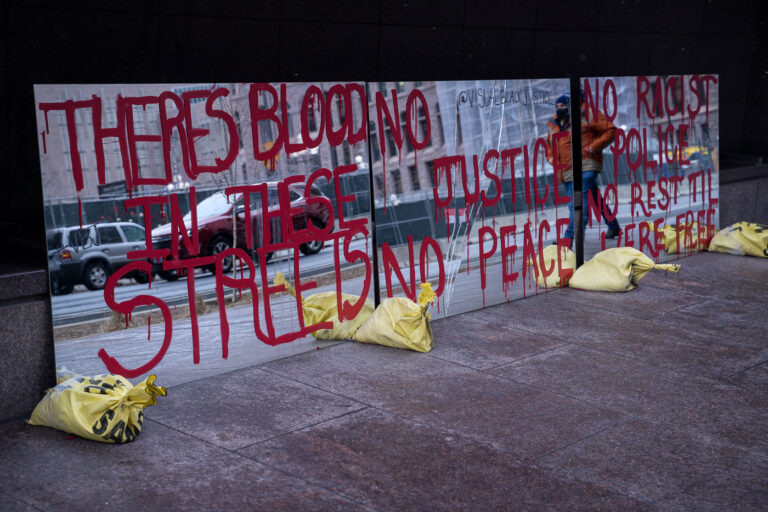 Theres Blood In These Streets mirror art 3 Protest signs in the form of mirrors outside the Hennepin County Government Center. The courthouse is currently holding the Derek Chauvin murder trial. Chauvin is charged in the May 25th murder of George Floyd in South Minneapolis.