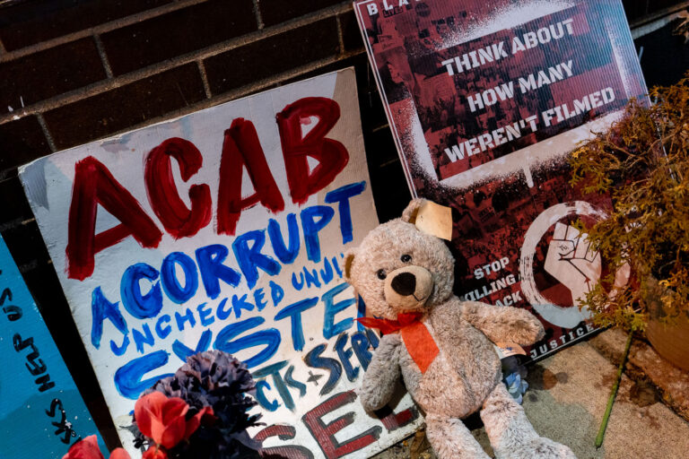 Think about how many weren't filmed at George Floyd Square 4 Protest signs leaning against Cup Foods in George Floyd Square.