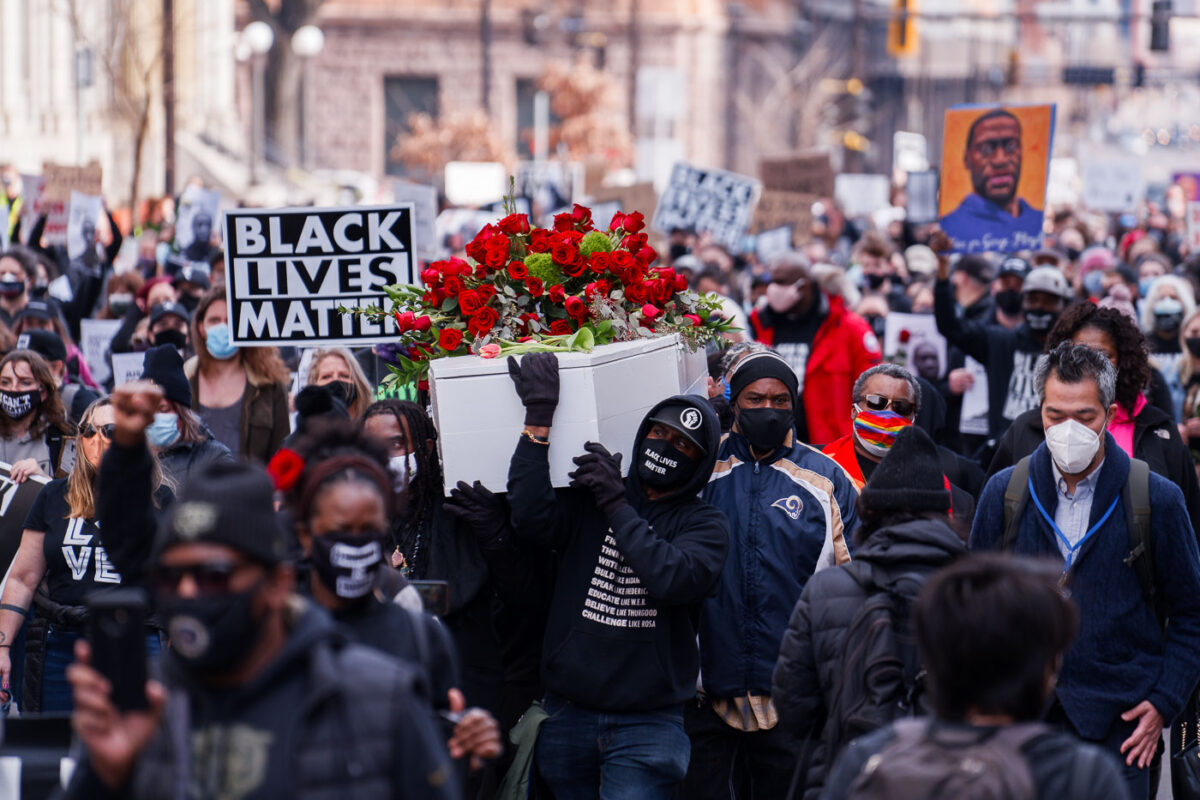 Thousands march the day before the start of jury selection in the Derek Chauvin murder trial. The former Minneapolis Police officer is charged with the murder of George Floyd on May 25th, 2020.