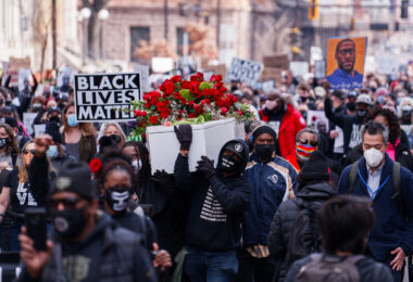 Thousands march the day before the start of jury selection in the Derek Chauvin murder trial. The former Minneapolis Police officer is charged with the murder of George Floyd on May 25th, 2020.