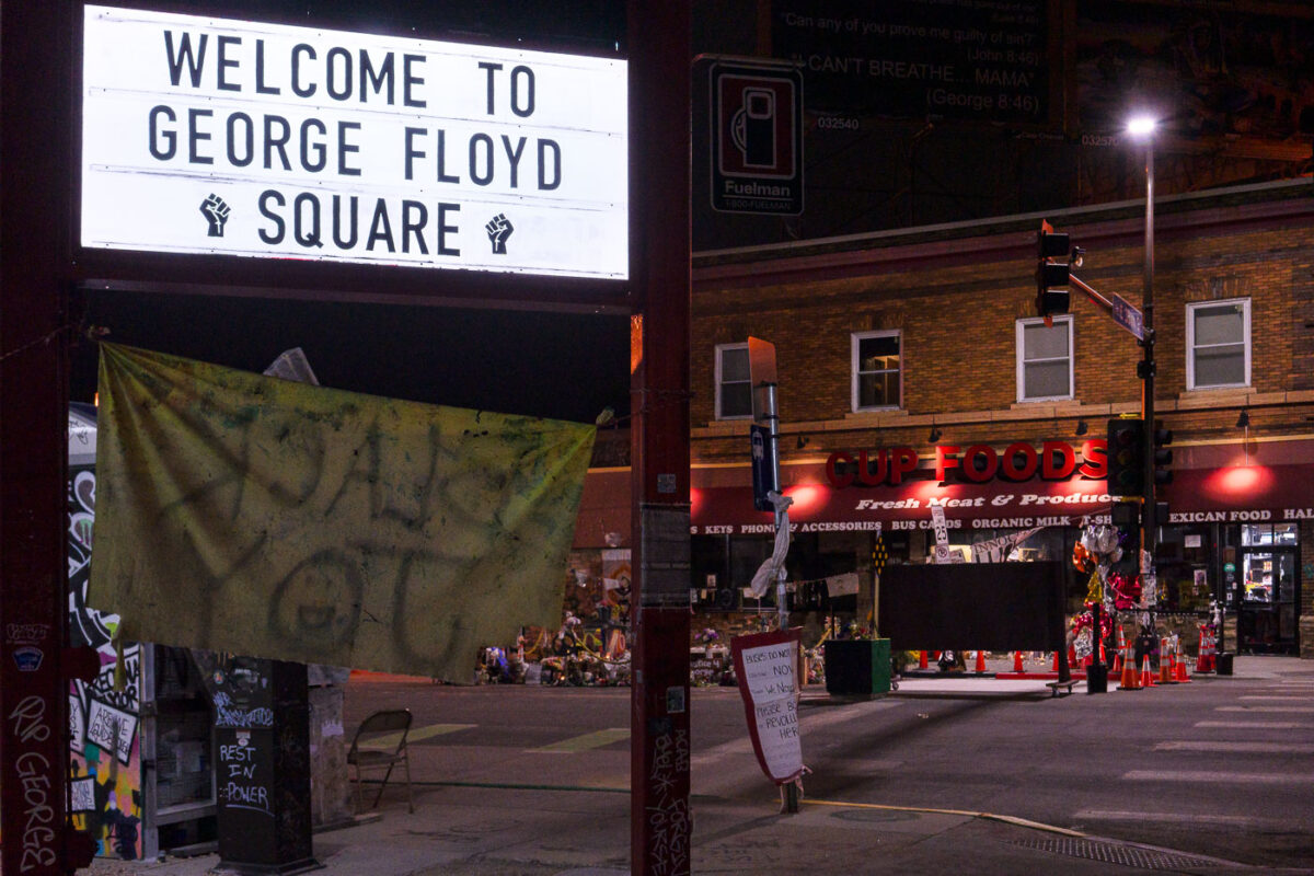 The former Speedway Gas sign reads "Welcome to George Floyd Square".