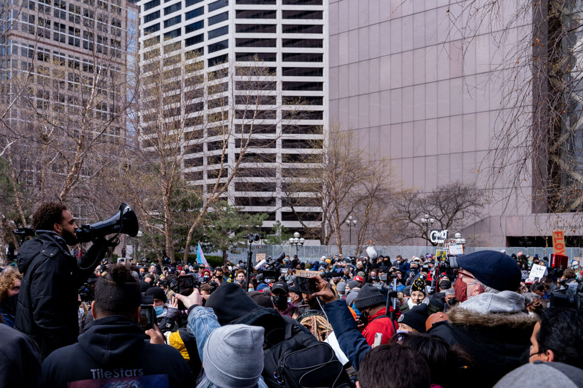 Brandyn Tulloch talks to the crowd gathered outside the Hennepin County Government Center after notice being given that a verdict in the Derek Chauvin murder trial would be read within 2 hours. Chauvin is charged in the May 25th, 2020 death of George Floyd.