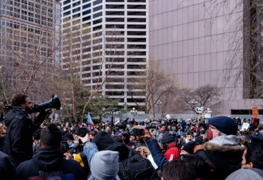 Brandyn Tulloch talks to the crowd gathered outside the Hennepin County Government Center after notice being given that a verdict in the Derek Chauvin murder trial would be read within 2 hours. Chauvin is charged in the May 25th, 2020 death of George Floyd.