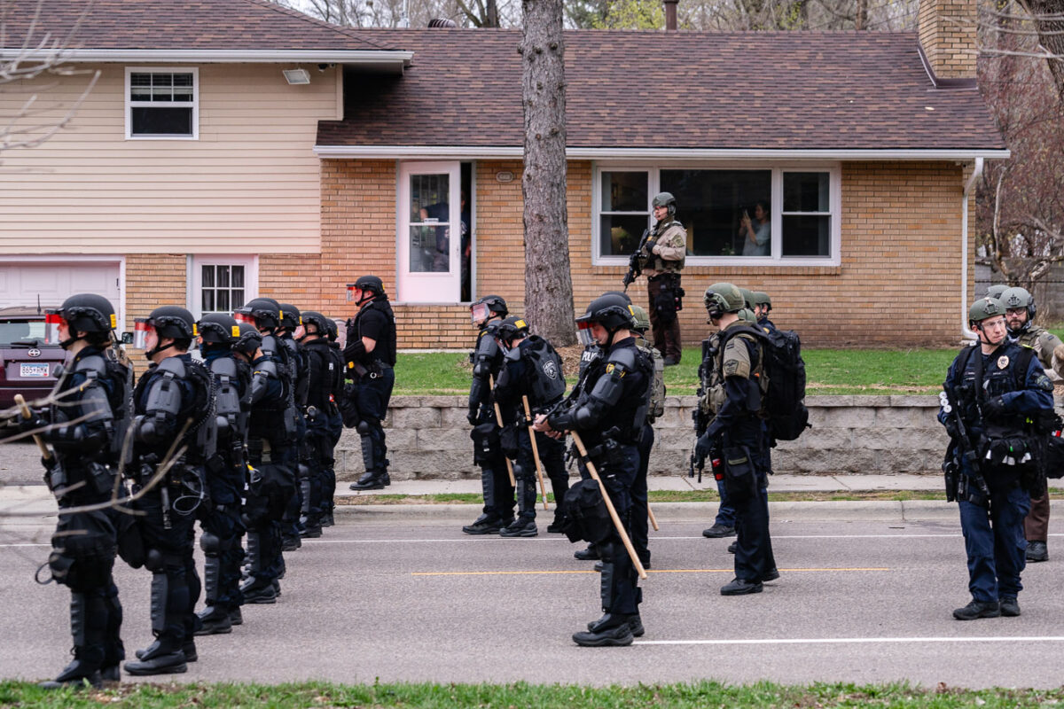 Police arrive at the scene of the Daunte Wright death as protesters gather.