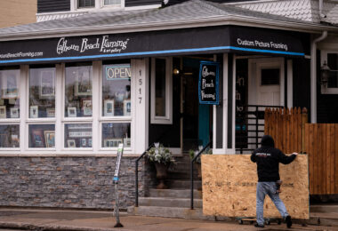 Boards going up on storefronts during the Derek Chauvin murder trial and unrest over the police killing of Daunte Wright in Brooklyn Center.