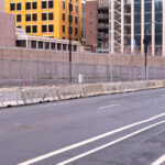 United States Federal courthouse behind barricades and fencing during the Derek Chauvin murder trial.