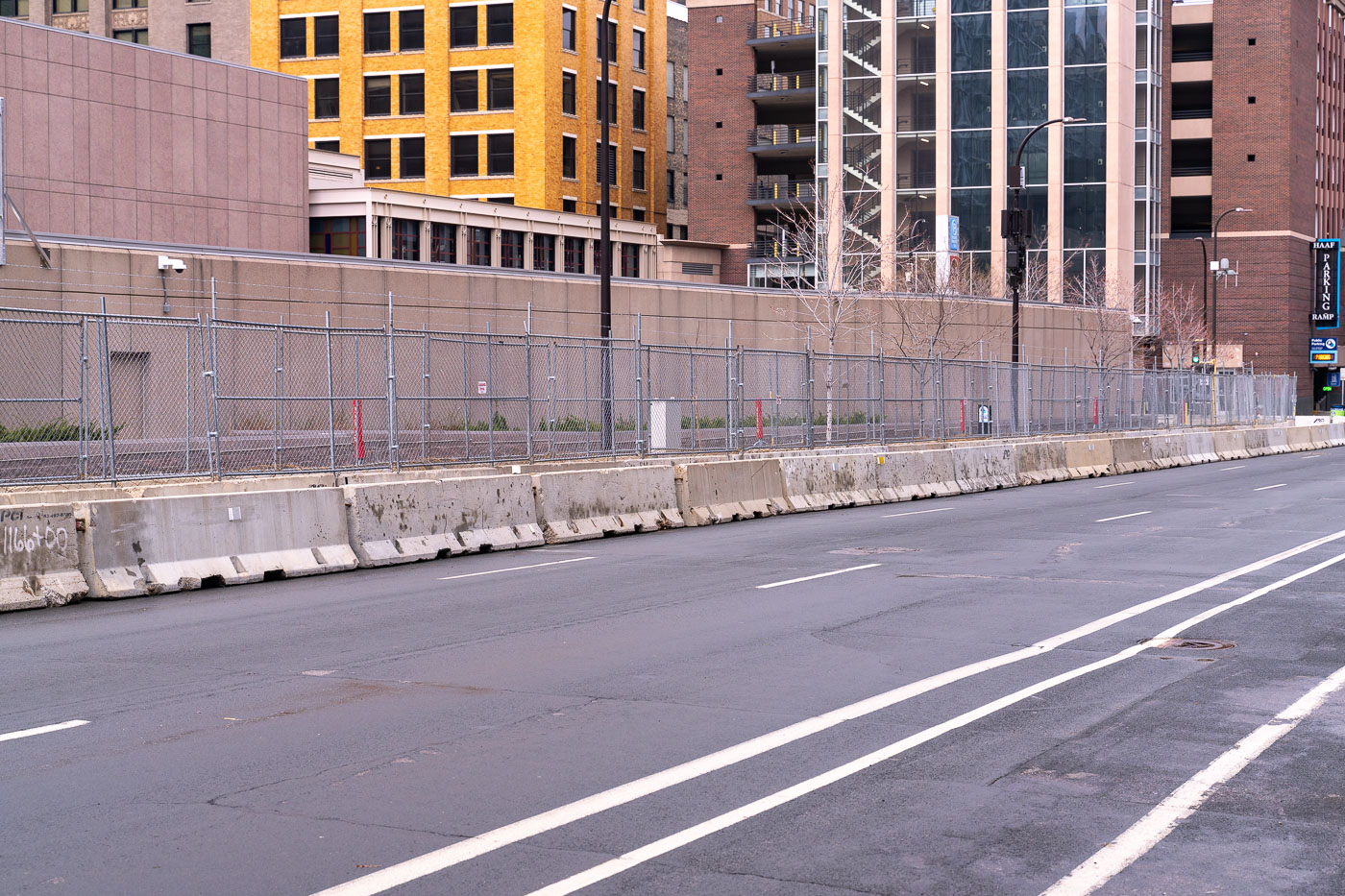 Federal courthouse behind fencing and barricades