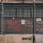 Chalk graffiti on a Hennepin County Government Center building. Derek Chauvin is currently on trial for the May 25, 2020 murder of George Floyd.