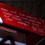 Written on the former gas pumps at the Speedway gas station at George Floyd Square: "they could give every one shelter, clean water, healthy food, but instead they bomb other countries. fuck trump fuck obama"