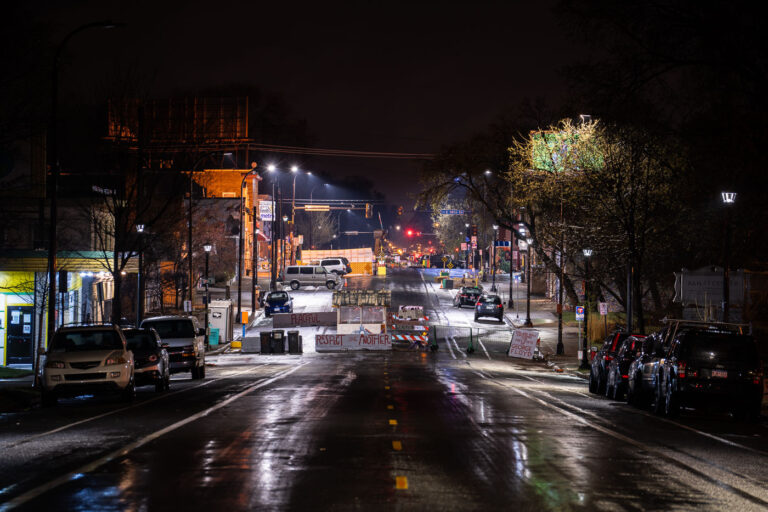 George Floyd Square barricades in the rain 1 George Floyd Square as seen from Chicago Ave.