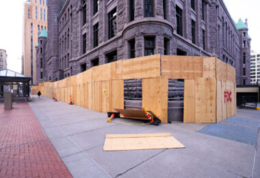 Heavy winds knock off boarding around the Minneapolis City Hall building in downtown Minneapolis.