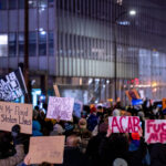 Protesters march through downtown Minneapolis during the Derek Chauvin murder trial.