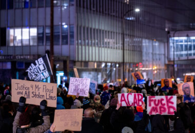 Protesters march through downtown Minneapolis during the Derek Chauvin murder trial.