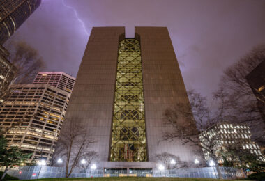 The skies over Hennepin County Government Center lit up by lightning. The heavily guarded and fortified courthouse in Downtown Minneapolis is where the Derek Chauvin murder trial is taking place. Chauvin is charged in the May 25th, 2020 murder of George Floyd.