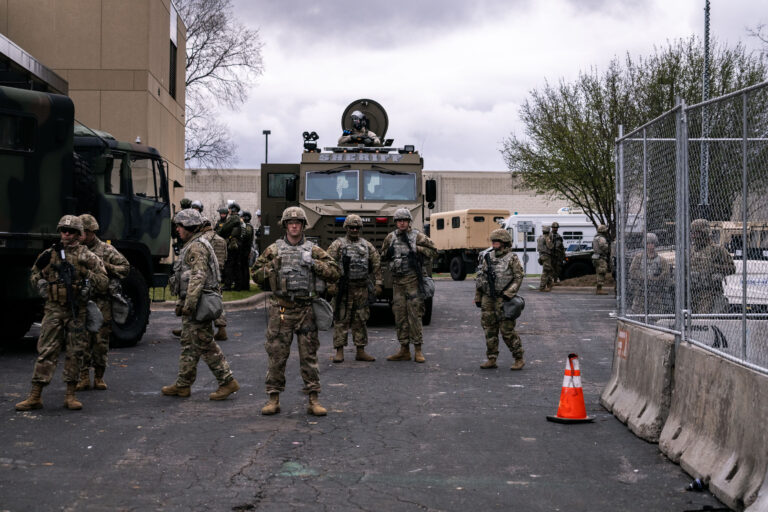 National Guard Deploys Outside Brooklyn Center Police Station 3 National Guard troops outside Brooklyn Center Police Station in Brooklyn Center, Minnesota.