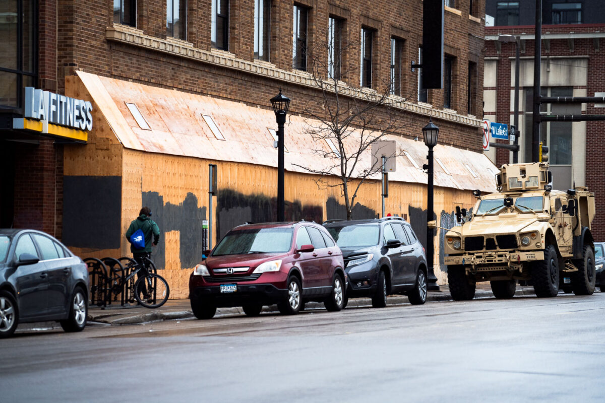 A National Guard vehicle parked on Lake Street near Hennepin Avenue after Daunte Wright is killed by Brooklyn Center police.