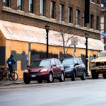 A National Guard vehicle parked on Lake Street near Hennepin Avenue after Daunte Wright is killed by Brooklyn Center police.