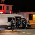 A Minneapolis Police tactical team coming out of a van after reports of looting in Uptown Minneapolis.