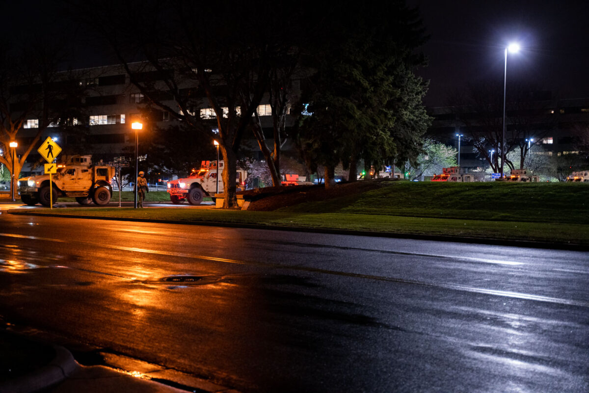 National Guard vehicles depart staging area in Brooklyn Center.