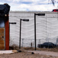 "No Justice, No Street!" written on the side of 35W as seen from a former post office.