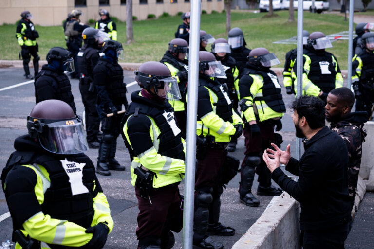 Protester talks to police after Daunte Wright was killed 2 A man tries to speak with the Minnesota State Patrol who is standing guard outside the Brooklyn Center Police Department. The Brooklyn Center Police shot and killed Daunte Wright the evening before.