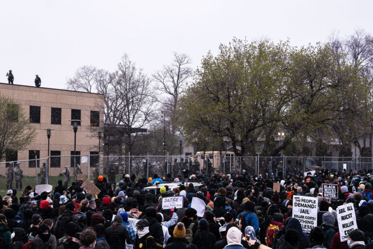 Protesters gathering outside Brooklyn Center PD 3 Brooklyn Center Police, Hennepin County Sheriffs, Minnesota State Patrol and the National Guard surround the police station as the community gathers to protest the death of 20-year old Daunte Wright. Wright was shot and killed by Brooklyn Park Police officer Kim Potter during a traffic stop on April 11th.