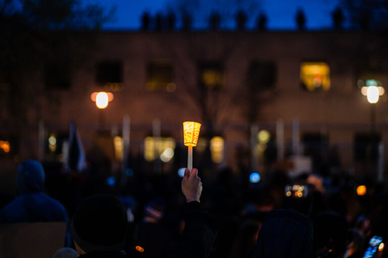 Protesters hold candles outside Brooklyn Center PD 4 Protesters gather for the 5th straight day at the Brooklyn Center Police Department after 20-year old Daunte Wright was shot and killed by a Brooklyn Center Police on April 11th, 2020.