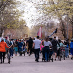 Protesters gather outside the residence of Governor Tim Walz to protest the treatment of protesters over the last week.