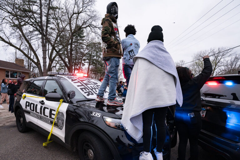 Protesters stand on top of Brooklyn Center squad car 2 Protesters arrive to the scene of the death of Daunte Wright. Wright was shot and killed by Brooklyn Center Police Officer Kim Potter hours earlier.
