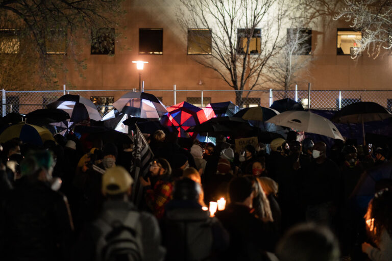 Protesters with umbrellas in Brooklyn Center 4 Protesters gather for the 5th straight day at the Brooklyn Center Police Department after 20-year old Daunte Wright was shot and killed by a Brooklyn Center Police on April 11th, 2020.