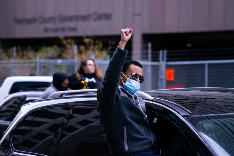 Raised fist after Chauvin is convicted 1 The crowd gathered outside the Hennepin County Government Center celebrates after Derek Chauvin was found guilty on all charges in the death of George Floyd.