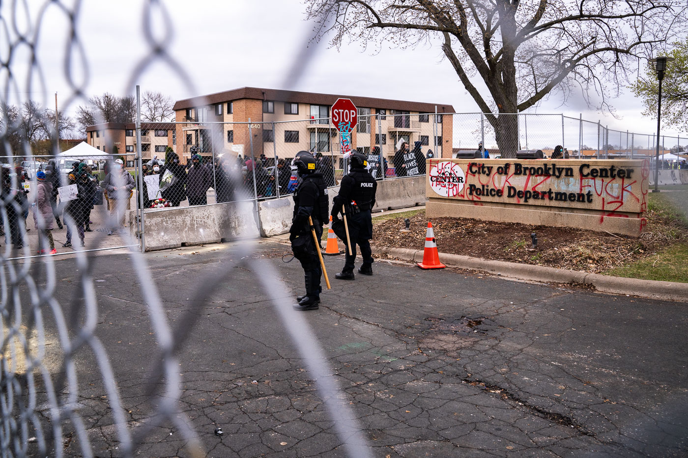 Riot police and protesters in Brooklyn Center Minnesota