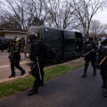 Police in riot gear arrive where protesters are gathered following the death of Daunte Wright.