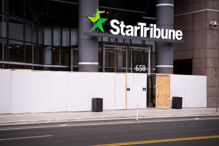 Star Tribune behind boarded windows 3 Boards at the Star Tribune across from the courthouse.