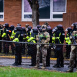 The State Patrol mobilize in Brooklyn Center to push protesters away from the Brooklyn Center Police Department after 20-year old Daunte Wright was shot and killed by a Brooklyn Center Police on April 11th, 2020.