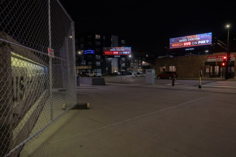 Trial of Derek Chauvin FOX9 billboard 3 FOX9 billboards in downtown Minneapolis. US Bank Stadium to the left behind security fencing.