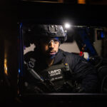 University of Minnesota Police Department arrive at the Brooklyn Center Police Department following unrest over the shooting of Daunte Wright. Wright was shot by Brooklyn Center Police Officer Kim Potter.