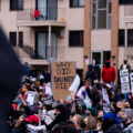 Protesters outside the Brooklyn Center Police Department, where residential apartments are directly across the street.